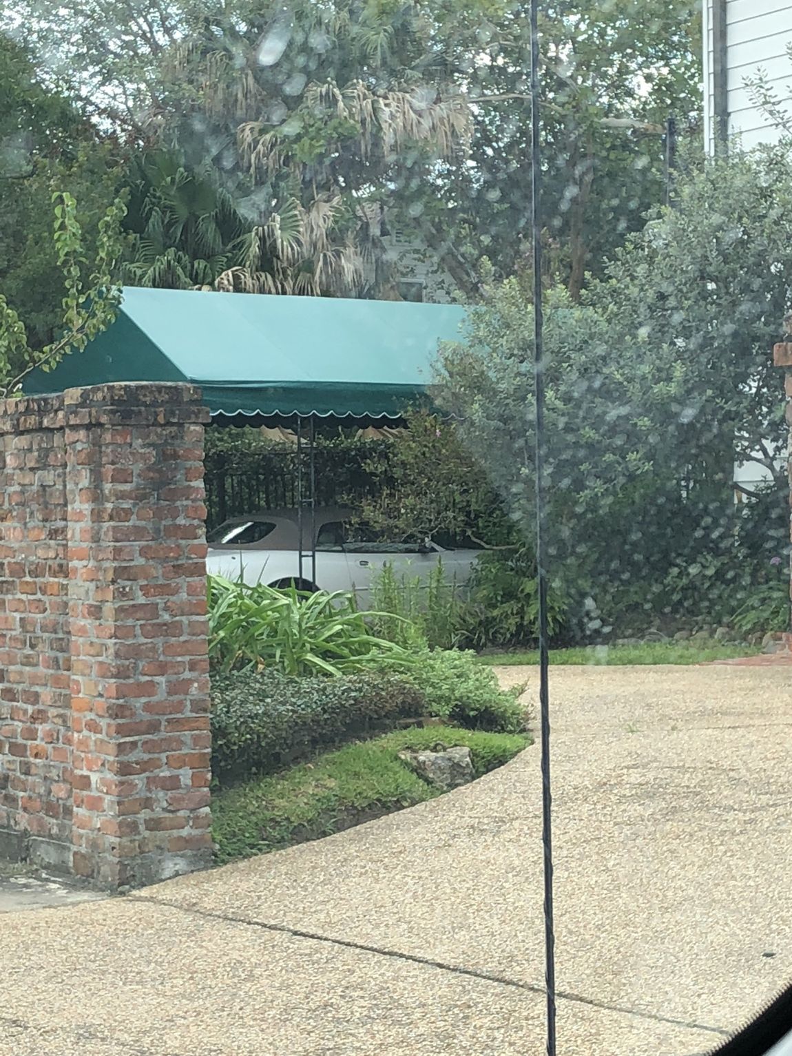 Custom Canopies — Green Canopy With Car Parked in Chalmette, LA