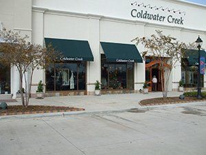Retractable Awnings Installation — Black Awnings Installed On The Windows in Chalmette, LA Retractable Awnings Installation — Black Awnings Installed On The Windows in Chalmette, LA
