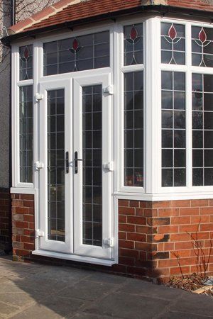white framed windows and doors
