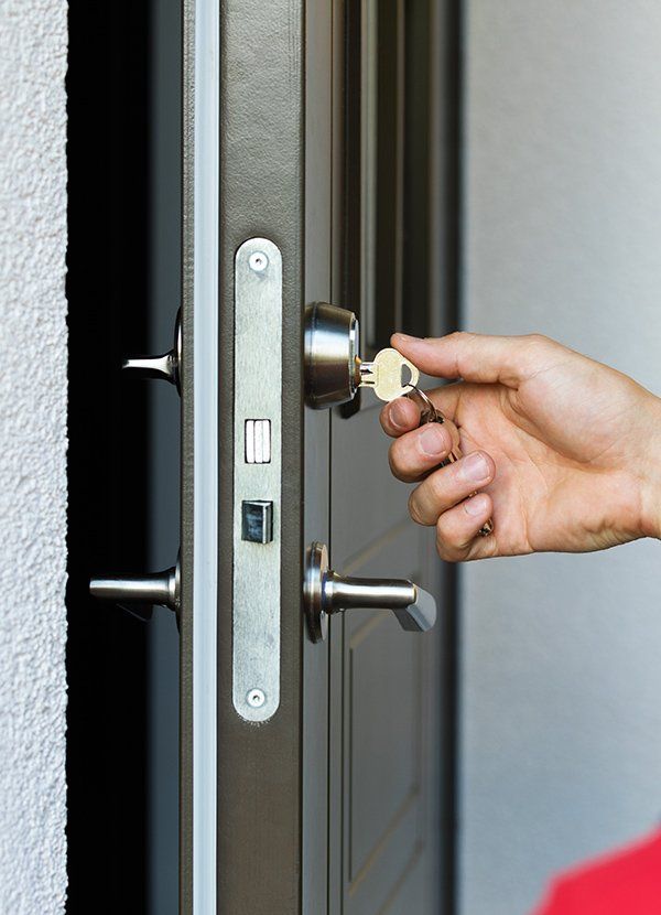Opening Door Lock with Key — Safe N Sound Locksmiths in Varsity Lakes, QLD