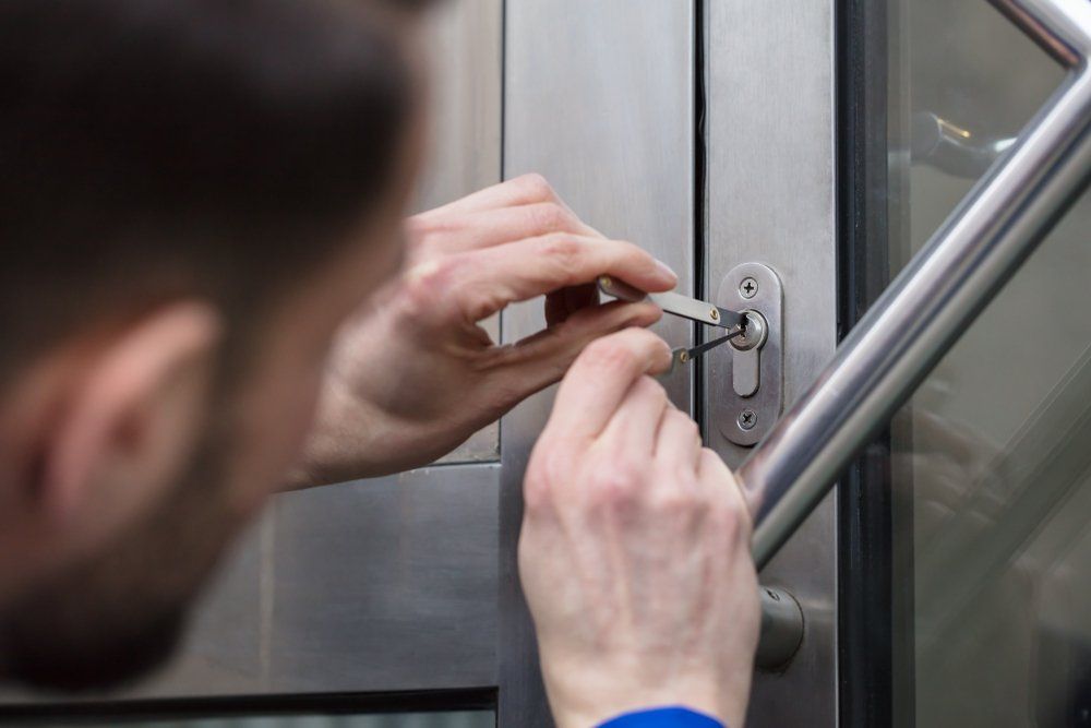 Installing New Lock into Door — Safe N Sound Locksmiths in Varsity Lakes, QLD