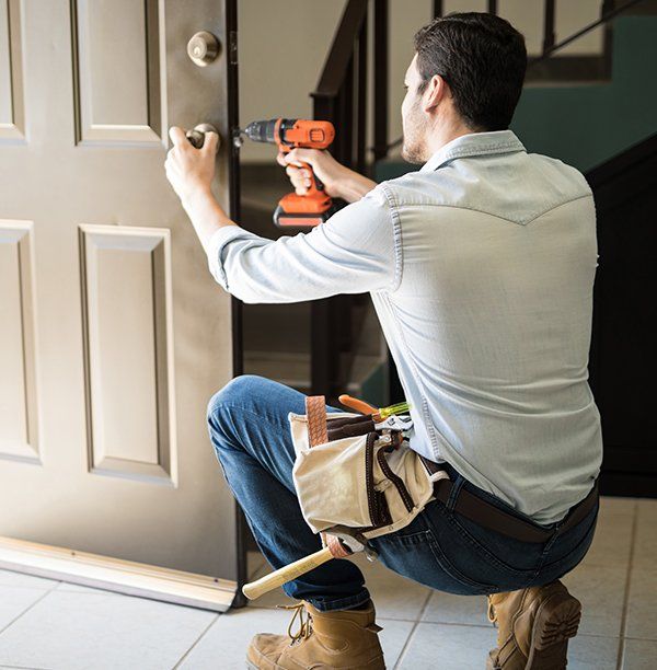 Locksmith Repairing Door Lock — Safe N Sound Locksmiths in Varsity Lakes, QLD