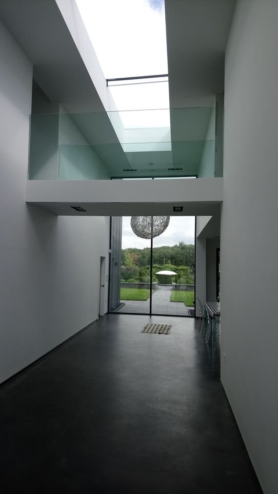 Contemporary link bridge with a skylight bringing natural light into the space 