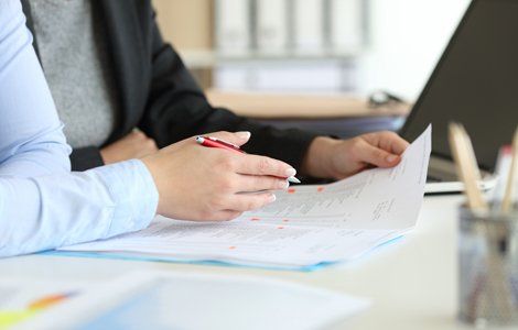 SAP Evaluations — Two Person Talking About Documents in Springfield, MO