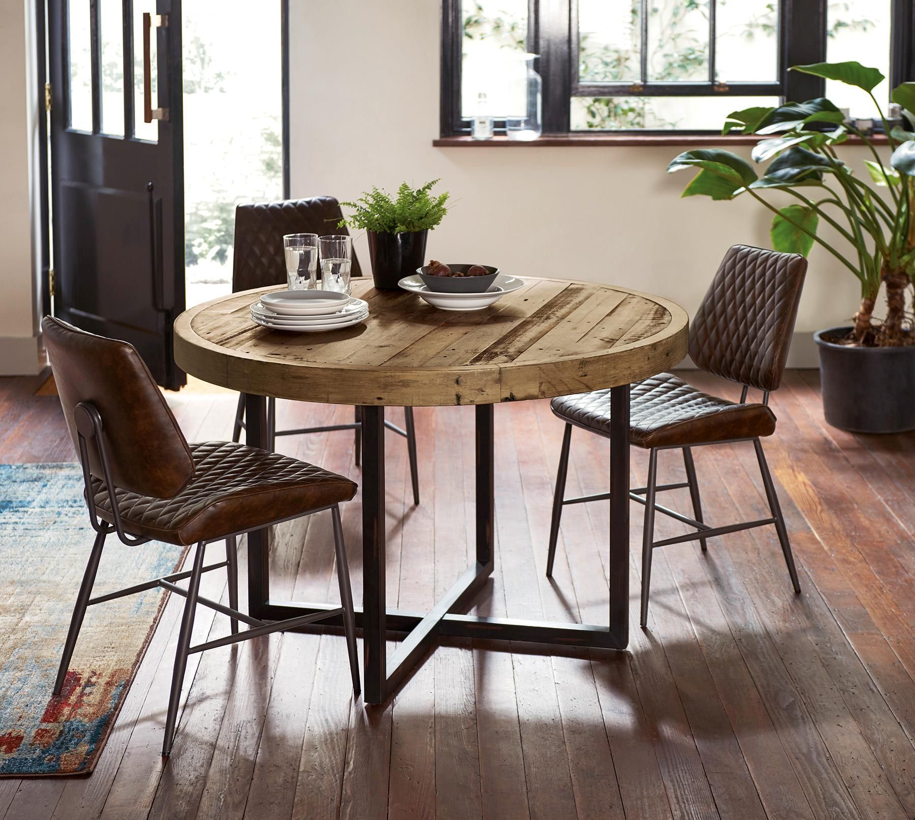 Manhattan dining room furniture with fireplace and studio lighting fixture