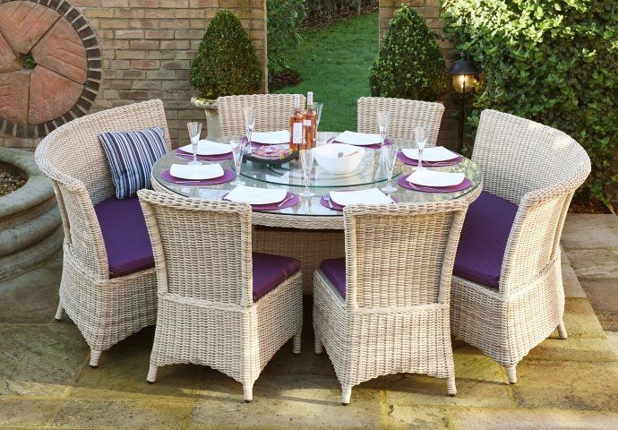 Big Outdoor Dining Table with Purple Cushions