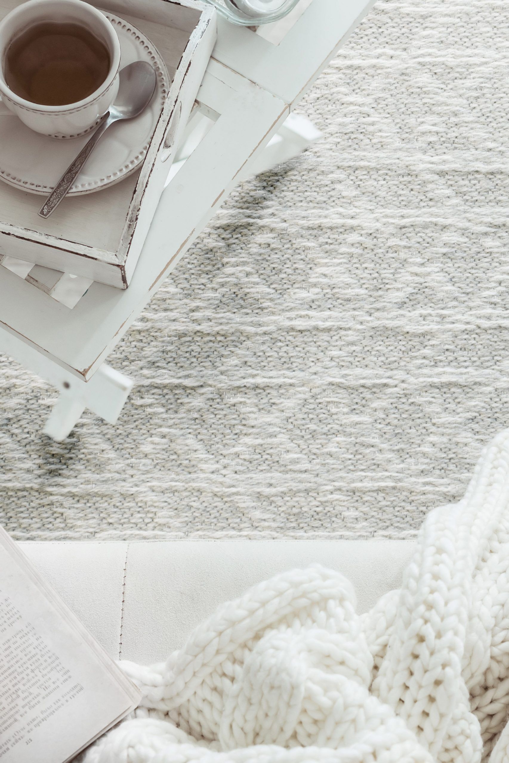 Bright white rug with textured imprint