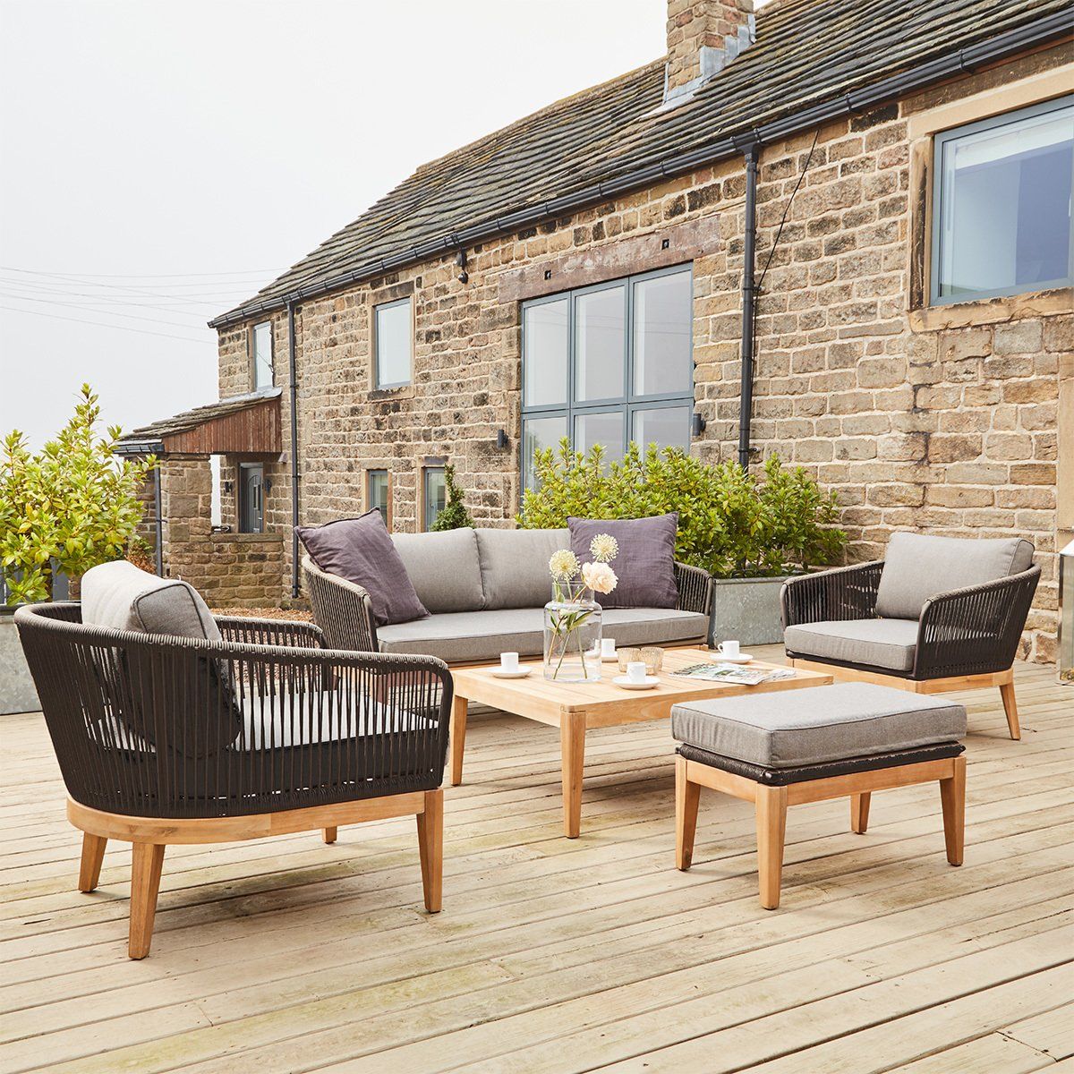 Black cane weave chair with natural wood support