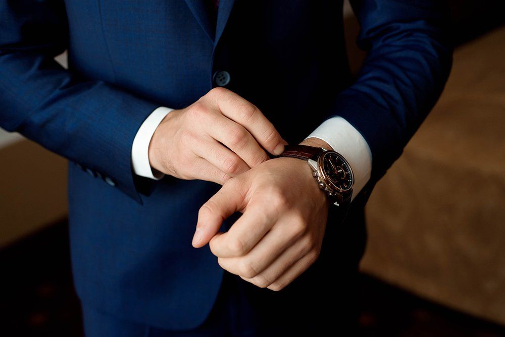 Adjusting His Watch — Clearwater, FL — Patrick Day Jewelers Adjusting His Watch — Clearwater, FL — Patrick Day Jewelers