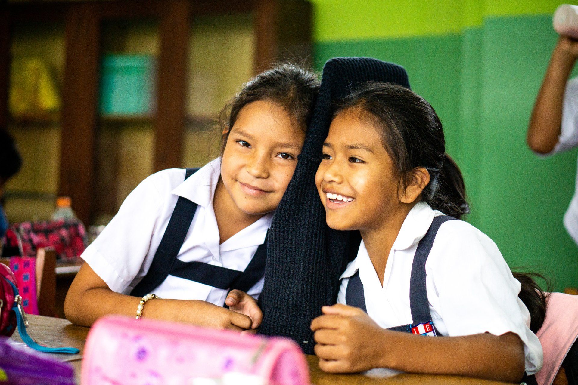 2 children smiling together
