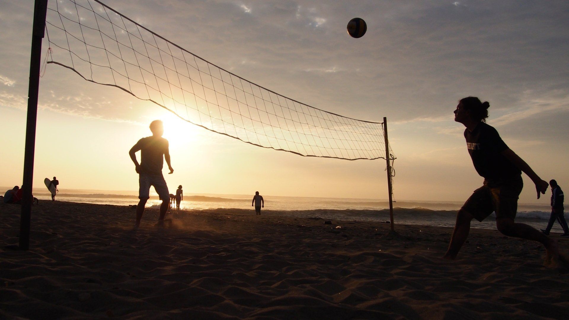 People playing volleyball on the beach at Huanchaco, Peru.
