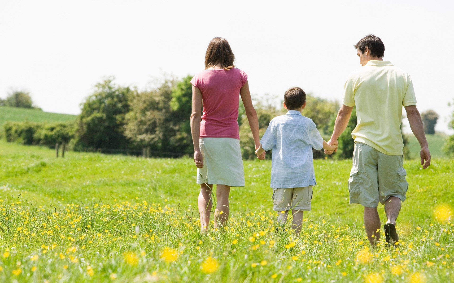 Family Walking On Field — Hillsville, VA — Tolbert & Tolbert, LLP Family Walking On Field — Hillsville, VA — Tolbert & Tolbert, LLP