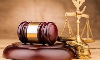 Gavel and Money Scales - elder law in Salem, MA Gavel and Money Scales - elder law in Salem, MA