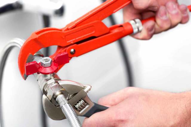 Tightening Bolts — Linden, VA — Brinson & Son Plumbing Company, LLC