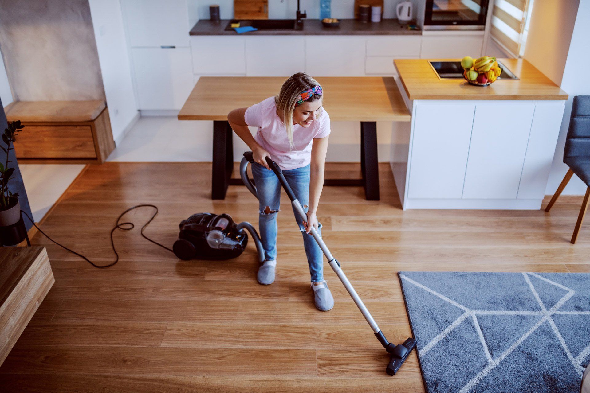 Women Cleaning Using Vacuum Cleaner — Mobile, AL — Presley & Son Electric Service