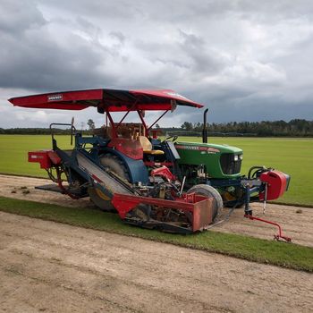 Red Tractor — Stedman, NC — Horne Turf Farm Red Tractor — Stedman, NC — Horne Turf Farm