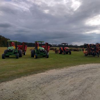 Tractors Parked on The Field — Stedman, NC — Horne Turf Farm Tractors Parked on The Field — Stedman, NC — Horne Turf Farm