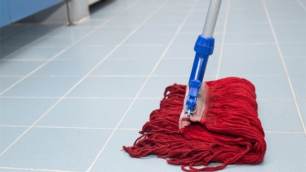 Toilet Floor Cleaning With Red Mob — Floor in Fort Walton Beach, FL Toilet Floor Cleaning With Red Mob — Floor in Fort Walton Beach, FL