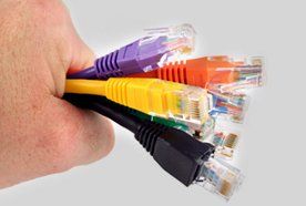 a person holding a bunch of wires