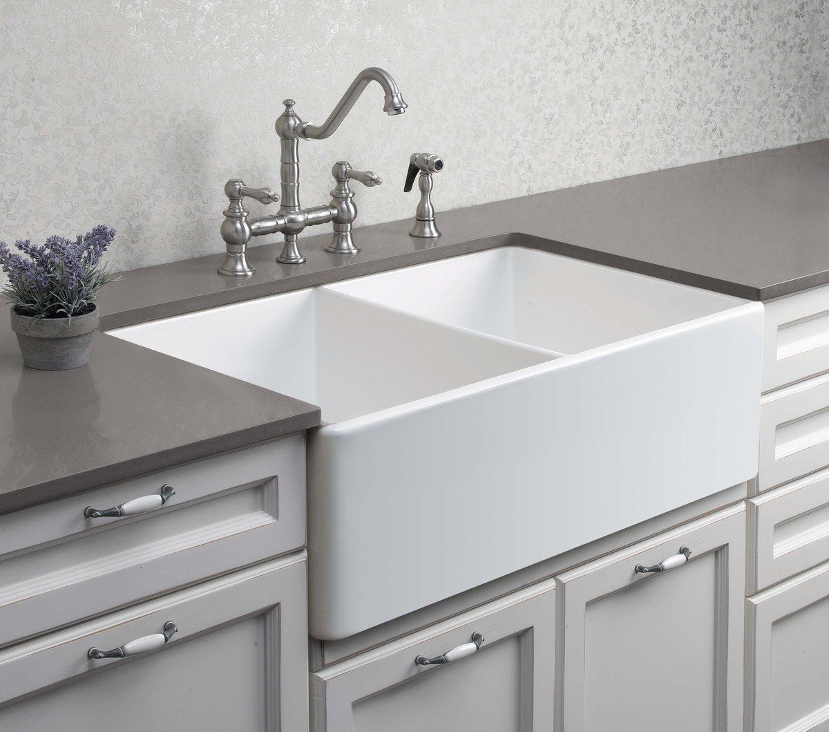 This Butler sink from Restorations Online is a great example of a twin farmhouse sink. This Butler sink from Restorations Online is a great example of a twin farmhouse sink.