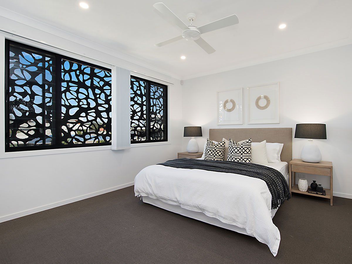 Privacy in a street facing bedroom is considered at the design stage.
