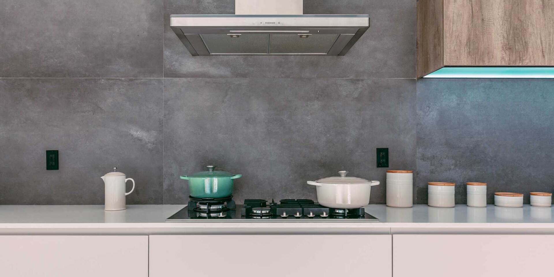 Using an extra large tile in a smaller area can be a cost effective way to create a stunning backsplash
