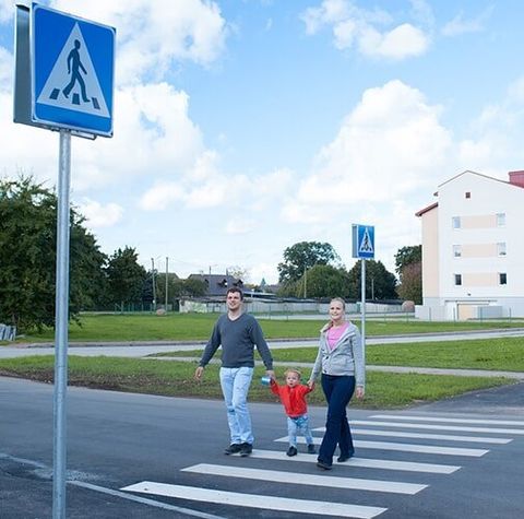 Family Crossing the Road — Traffic Control Services in Bundaberg,QLD Family Crossing the Road — Traffic Control Services in Bundaberg,QLD