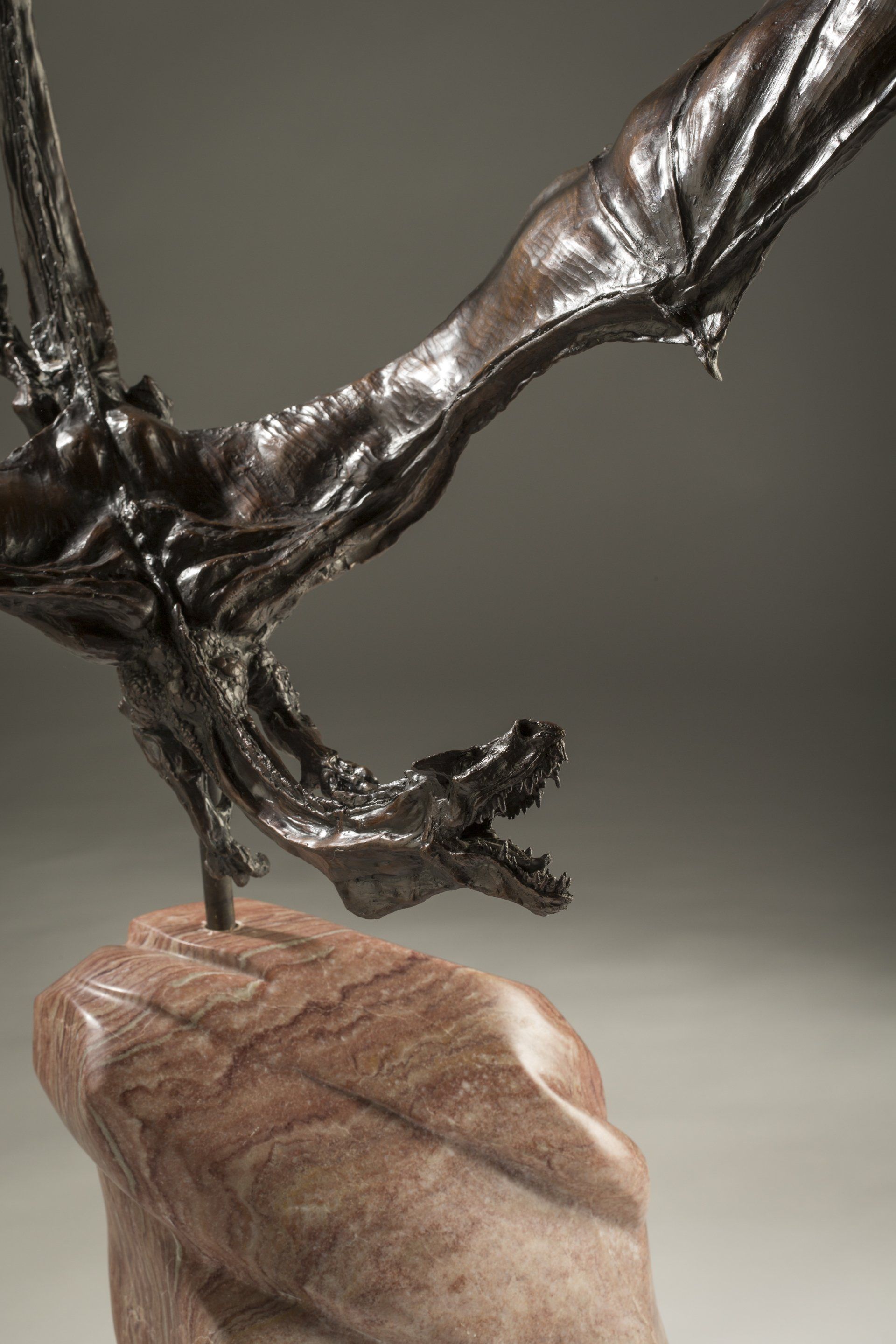 flying dragon sculpture in bronze side view