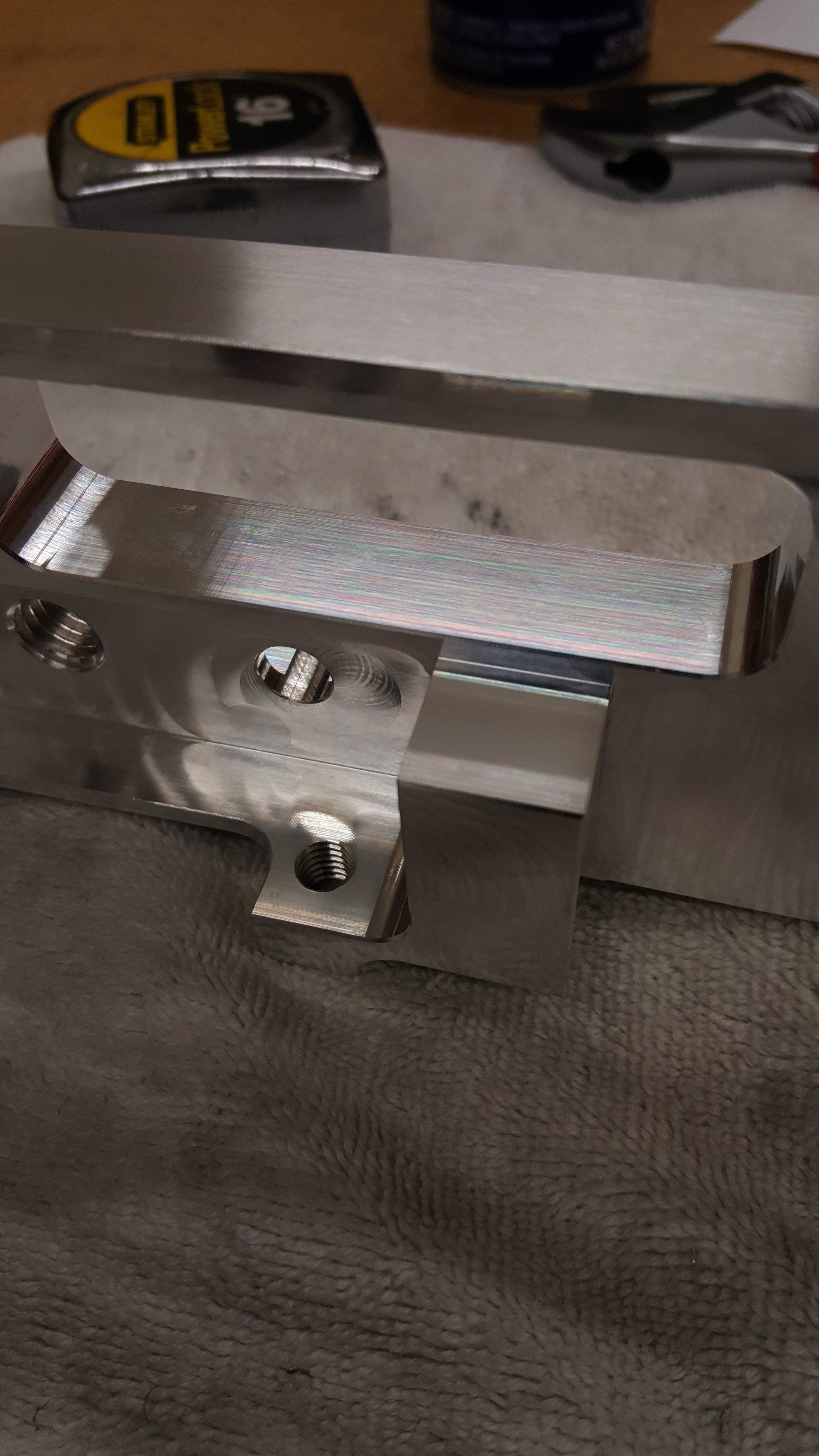A close up of a metal object on a table.