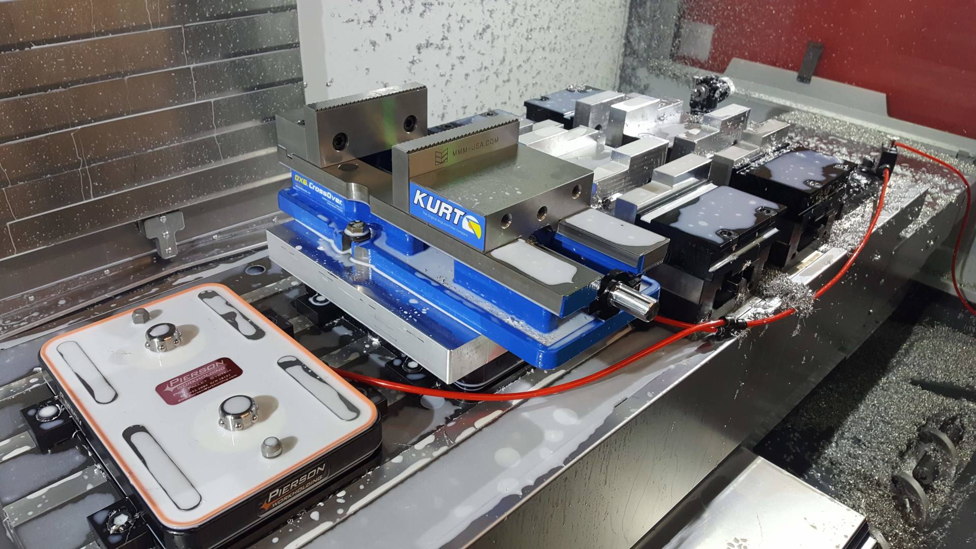 A machine is sitting on a table with a blue item that says ' tortex ' on it