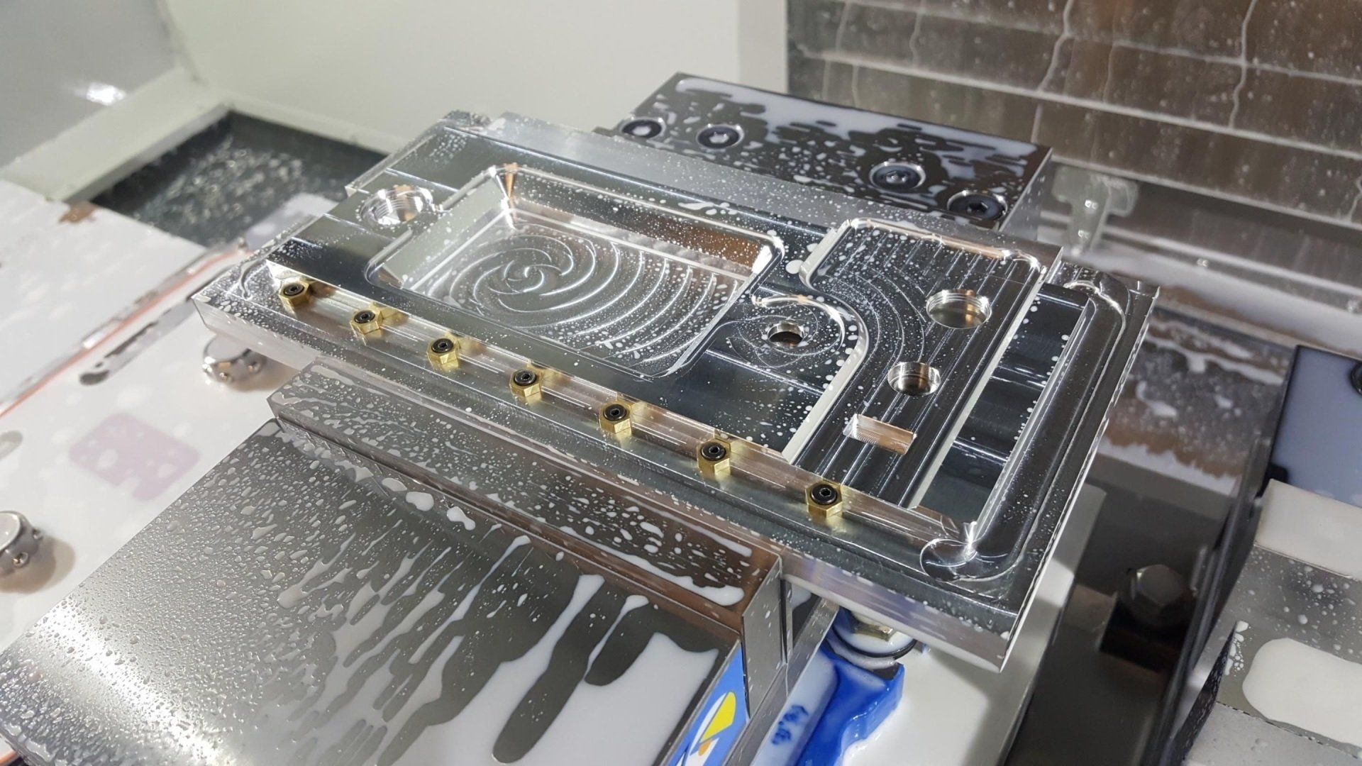 A piece of metal is sitting on top of a table.