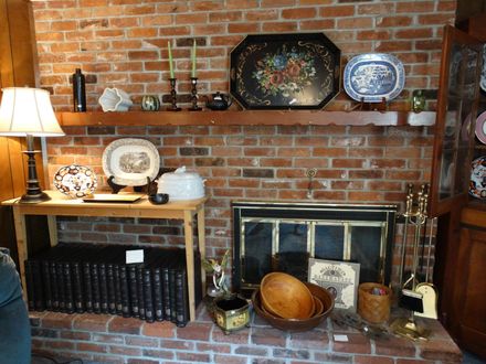 Estate Sales — Antique Furnitures in Eugene, OR A living room with a brick wall and a fireplace
