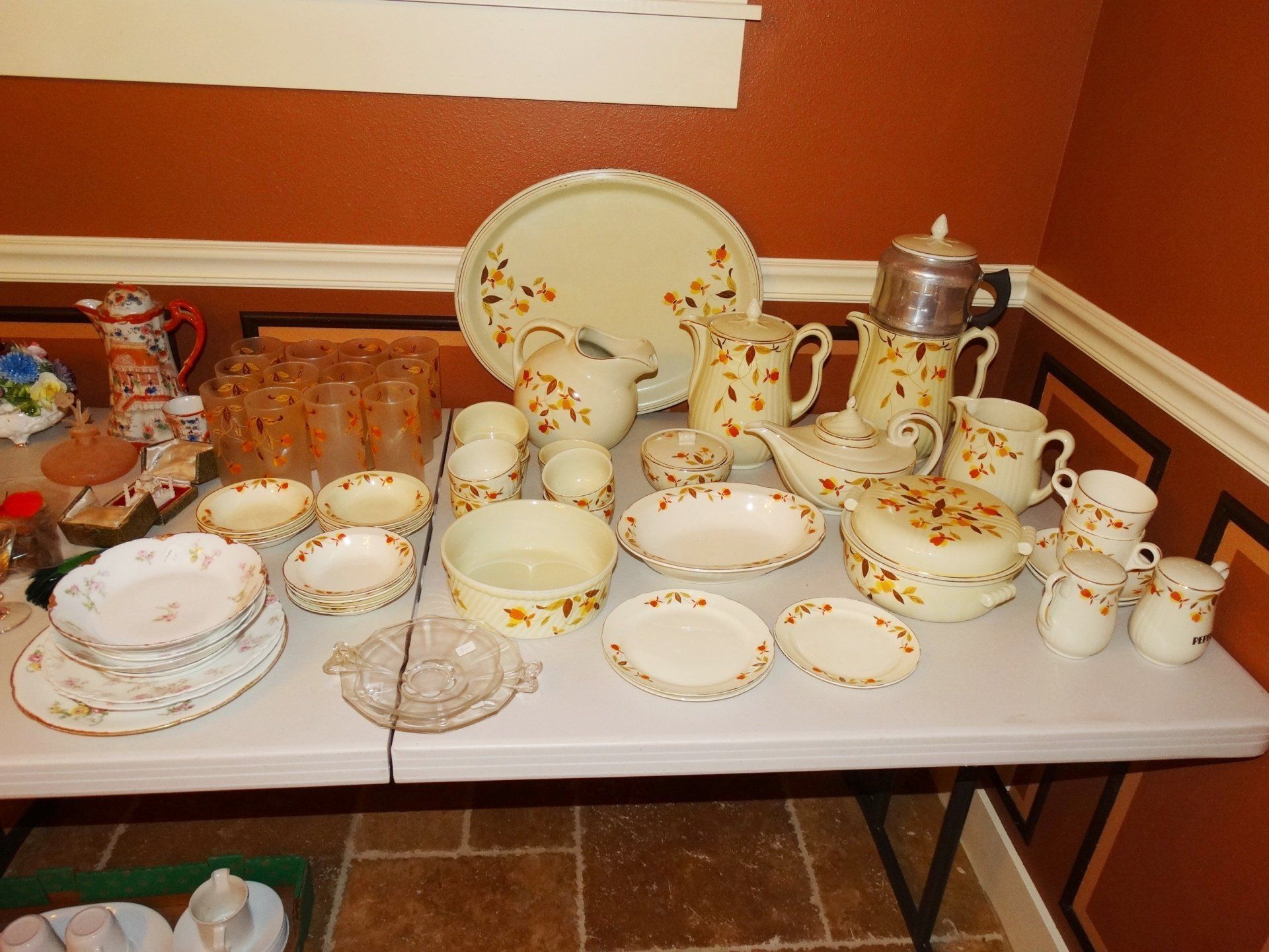 A table with a lot of plates and bowls on it