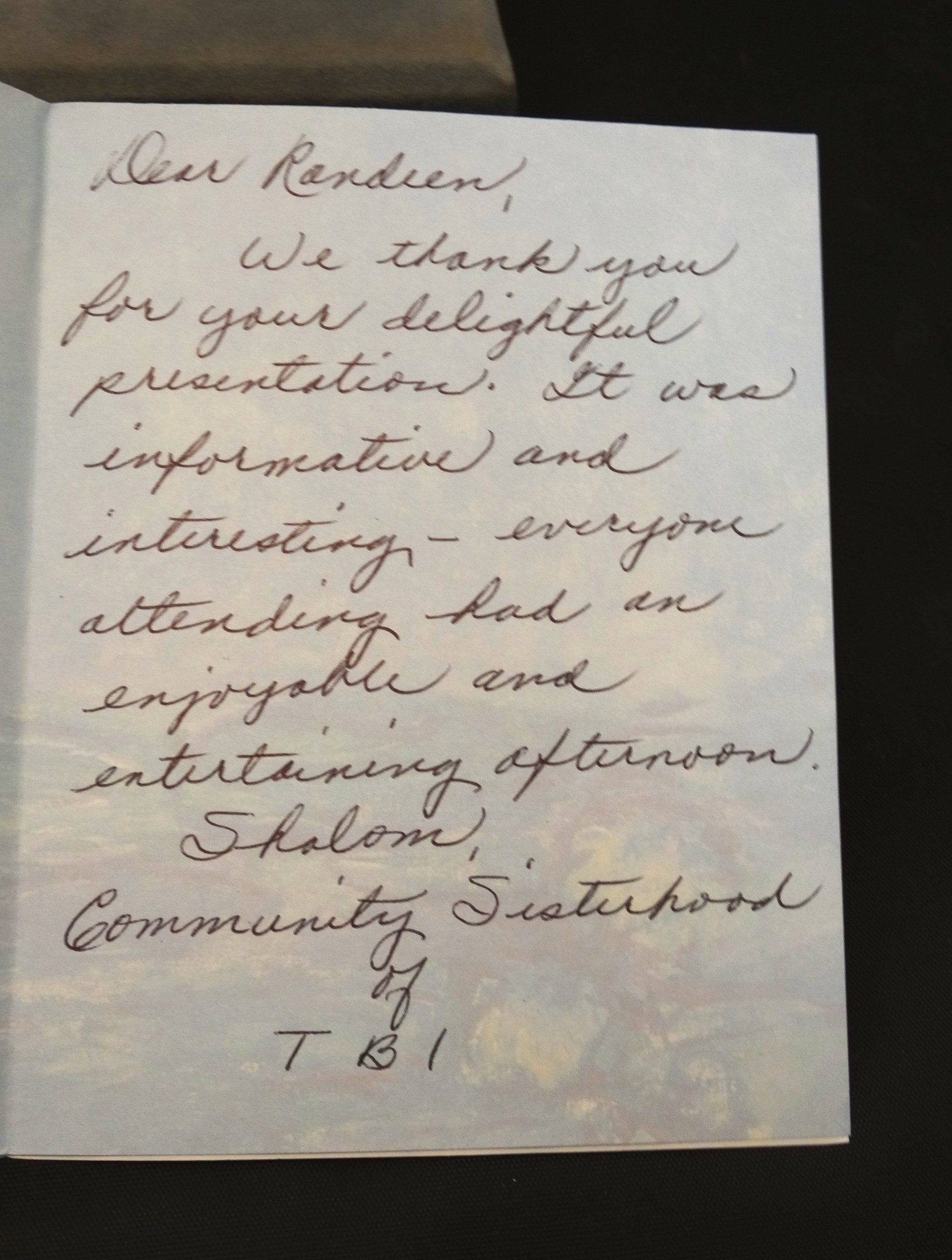 A handwritten letter is open to a page that says dear randrien
