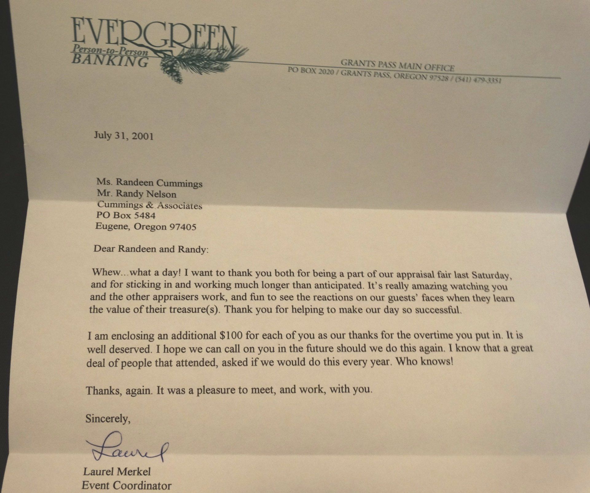 A letter is opened to a page that says evergreen