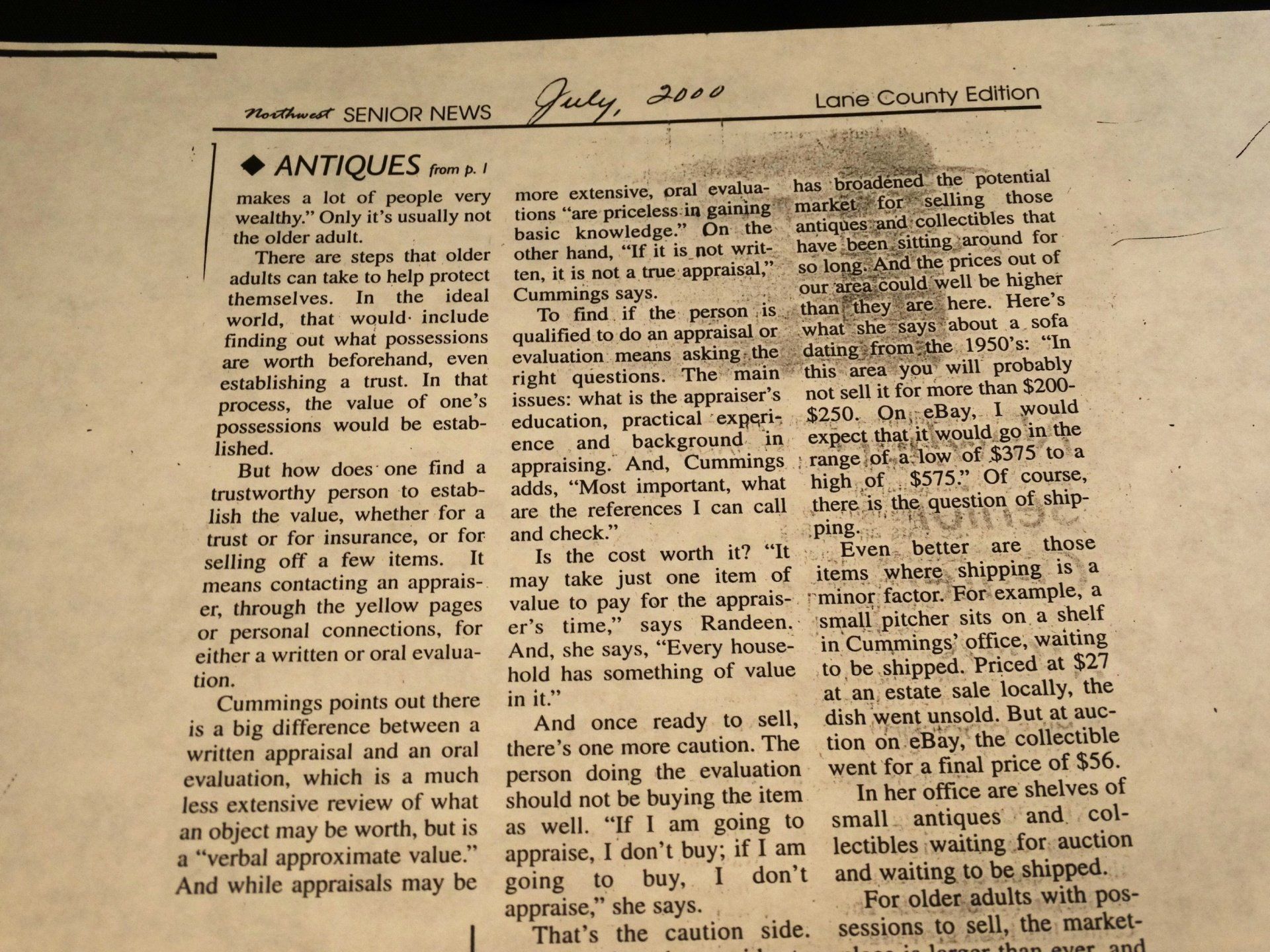 A newspaper article about antiques is dated july 2000