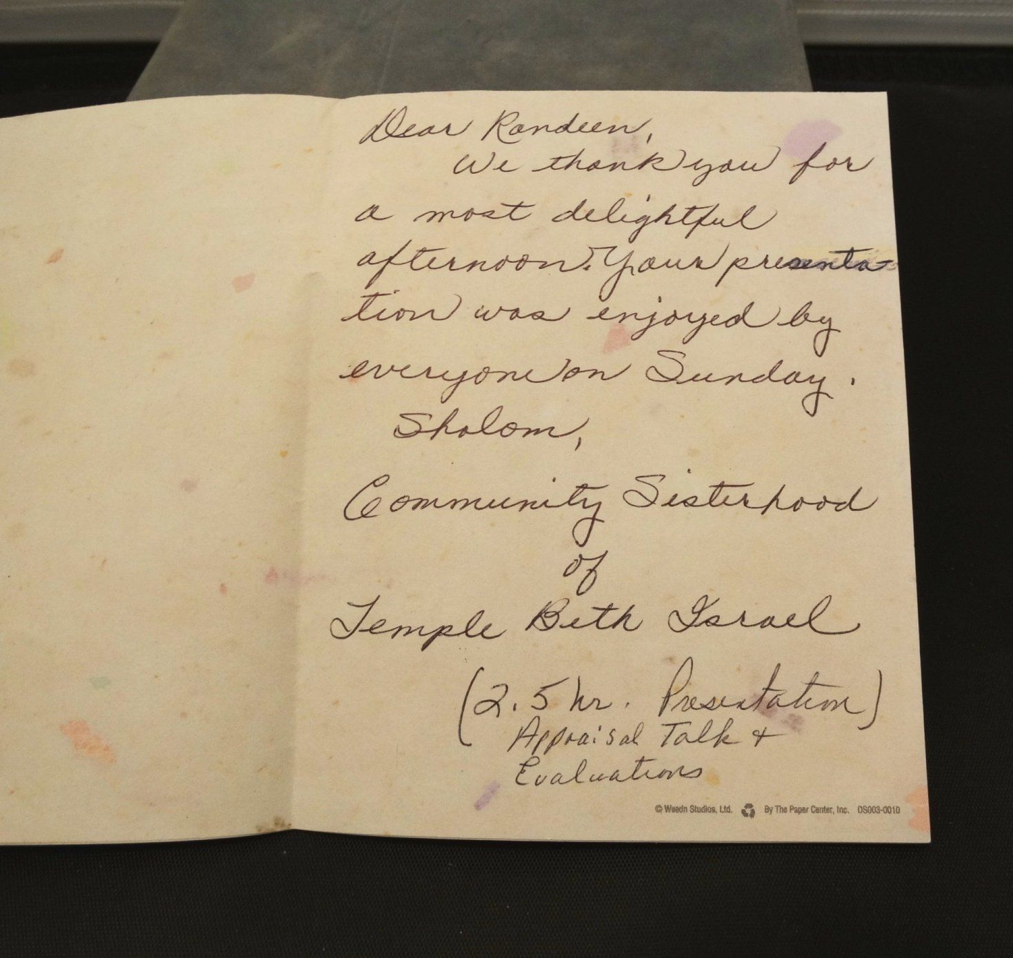 A handwritten letter is open to a page that says dear friends we thank you for a most delightful afternoon and your presence