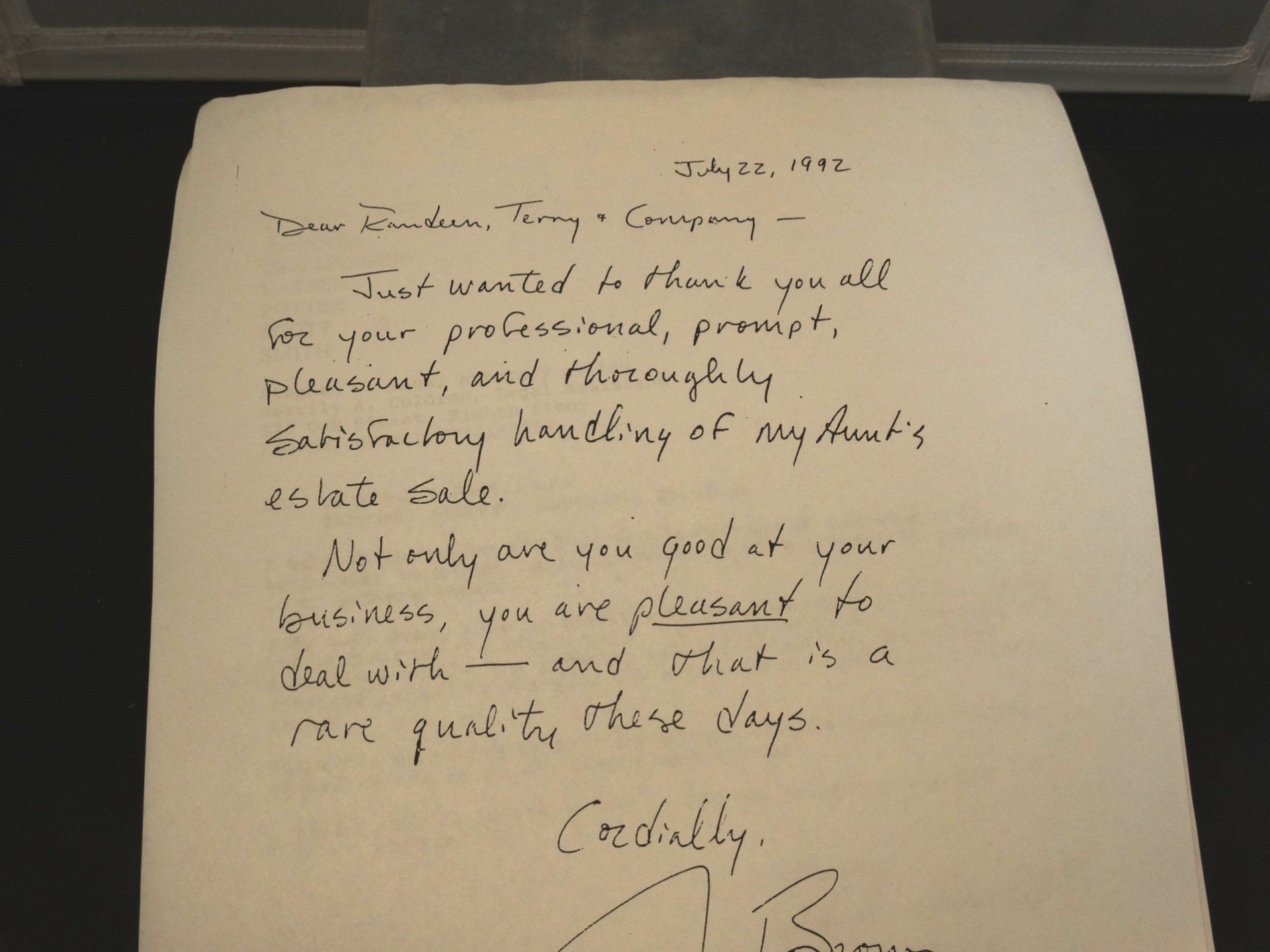 A handwritten letter is addressed to someone named cordially
