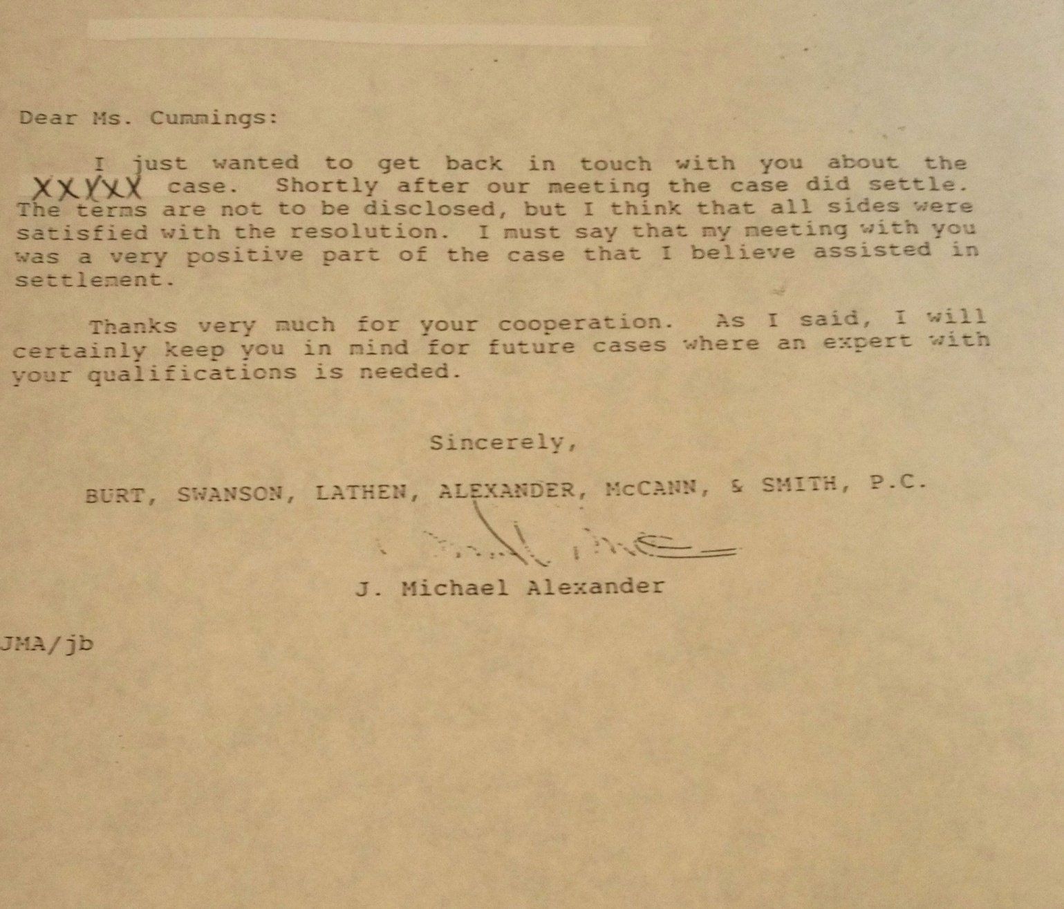 A black and white letter from j. michael alexander