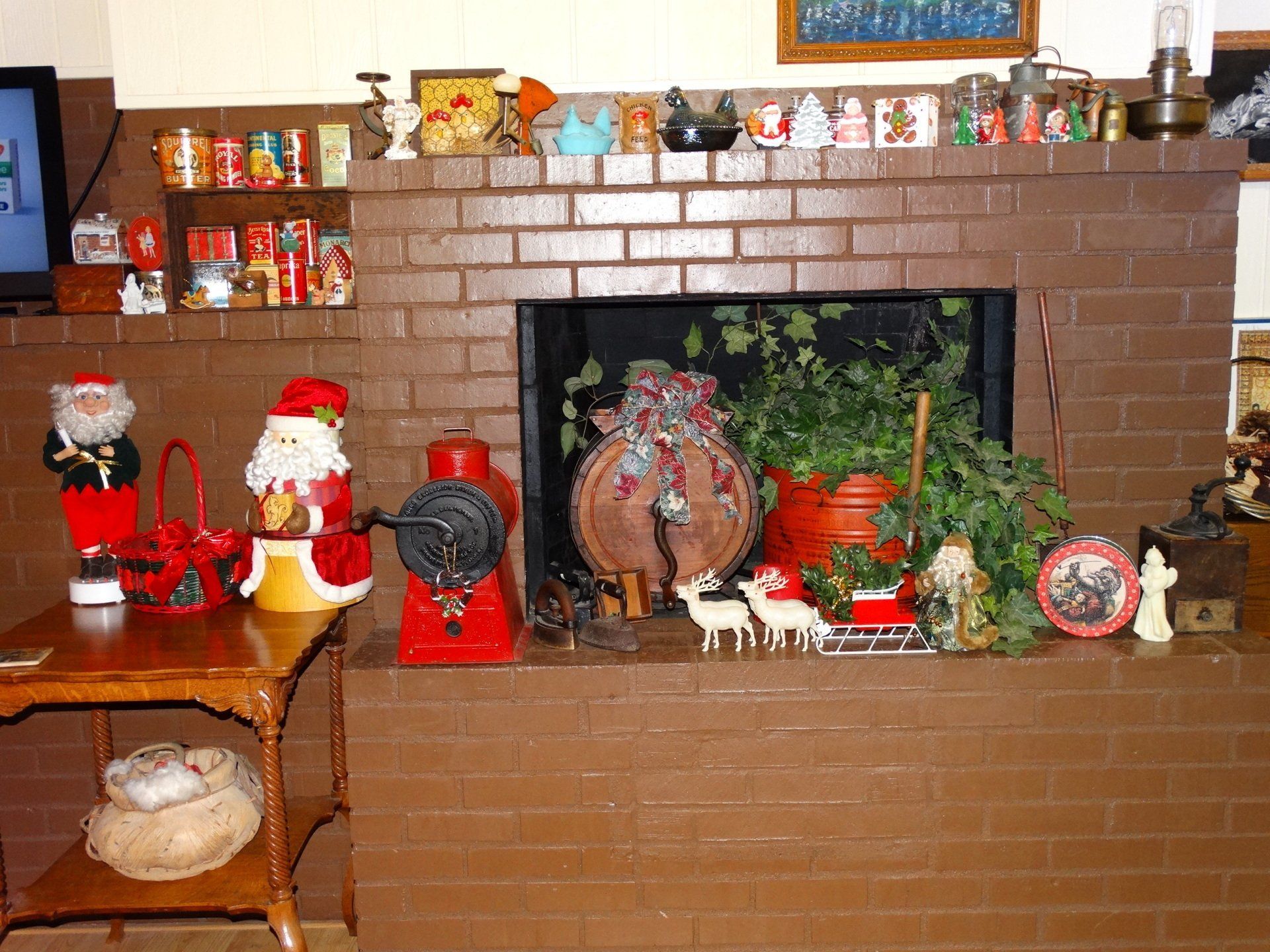 A brick fireplace with christmas decorations on it