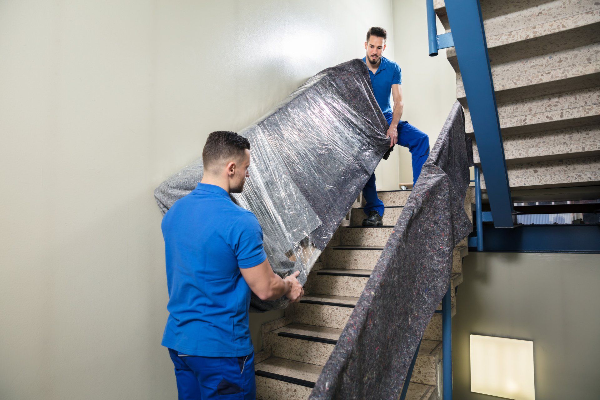 Carrying heavy boxes up stairs