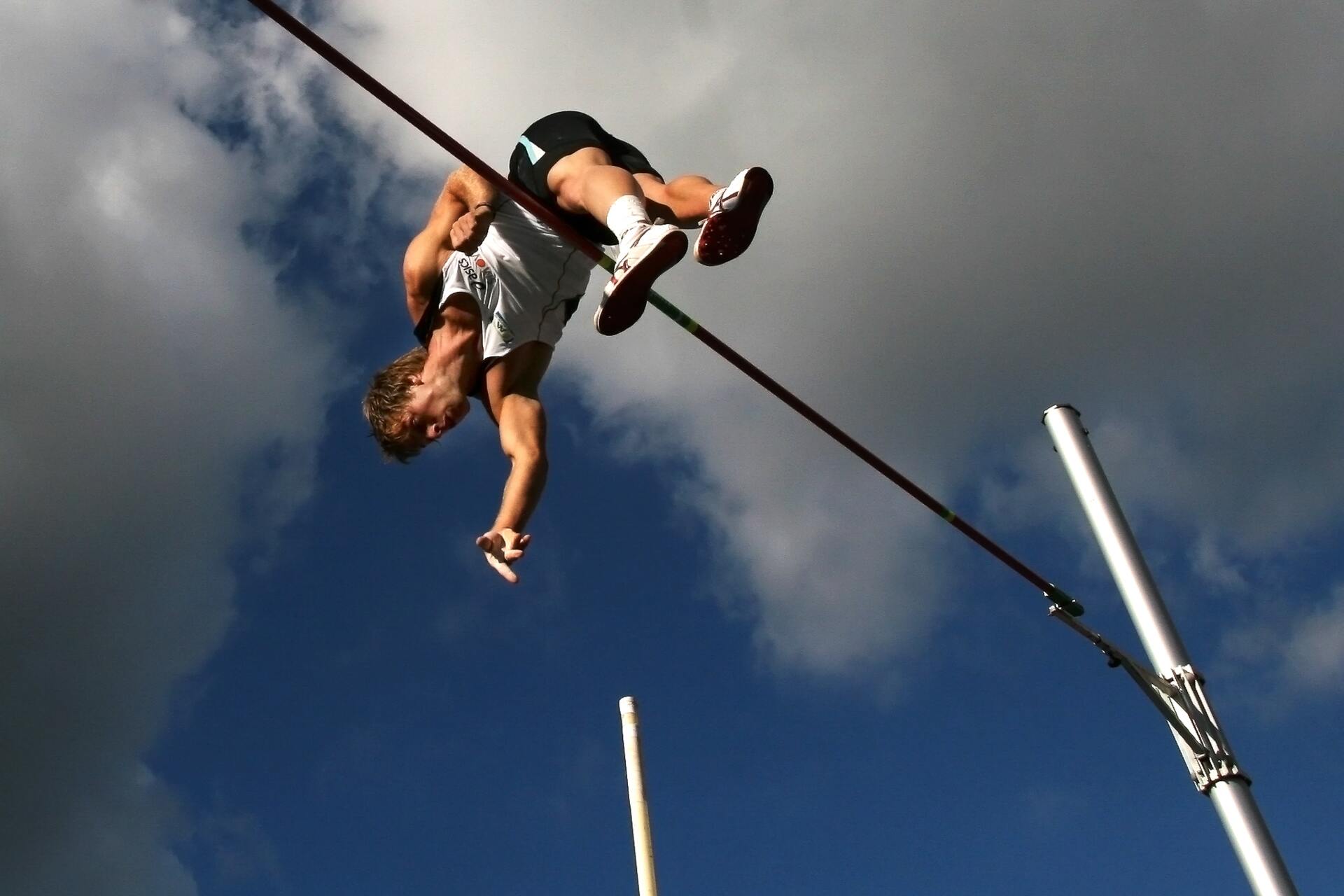 A high jumper going over the bar