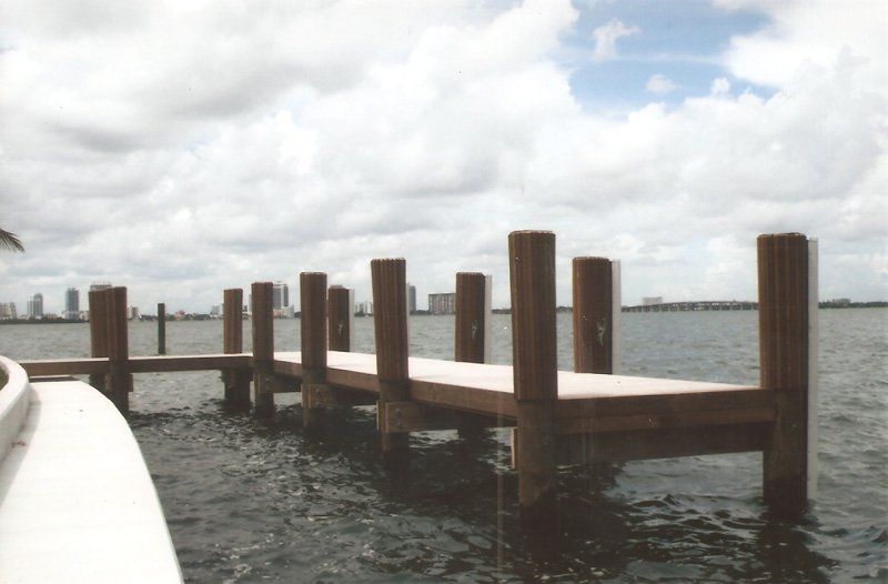 Fiberglass — White Custom Dock Under Blue Skies in Miami, FL