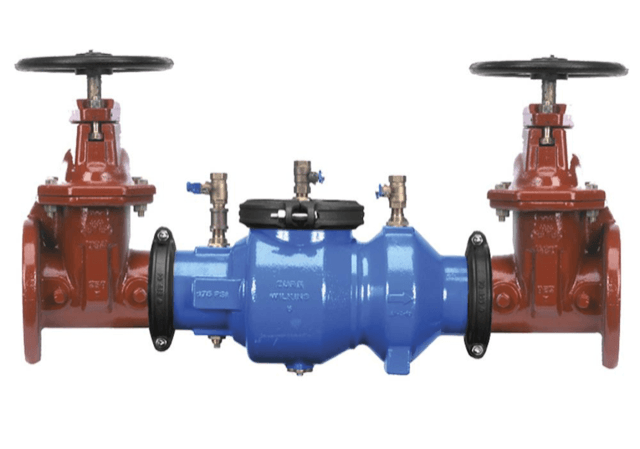 Blue and red industrial valve assembly with two red handwheel valves on either side