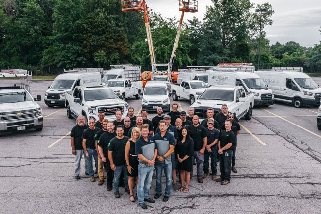 Euclid Glass Team in Front of Their Fleet — Willoughby, OH — Euclid Glass & Door Euclid Glass Team in Front of Their Fleet — Willoughby, OH — Euclid Glass & Door