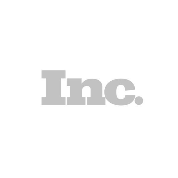 A gray inc logo on a white background.