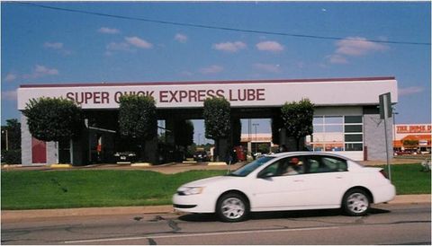 Mechanic Repairing Under the Car — Oklahoma City, OK — Super Quick Express Lube Mechanic Repairing Under the Car — Oklahoma City, OK — Super Quick Express Lube