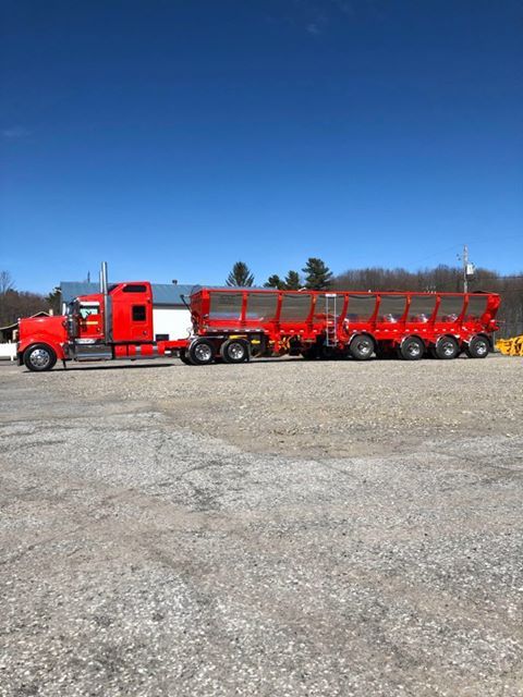 truck with Trout River Live Bottom trailer