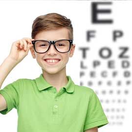 Little Girl being examined — eye care in Eaton, OH Little Girl being examined — eye care in Eaton, OH