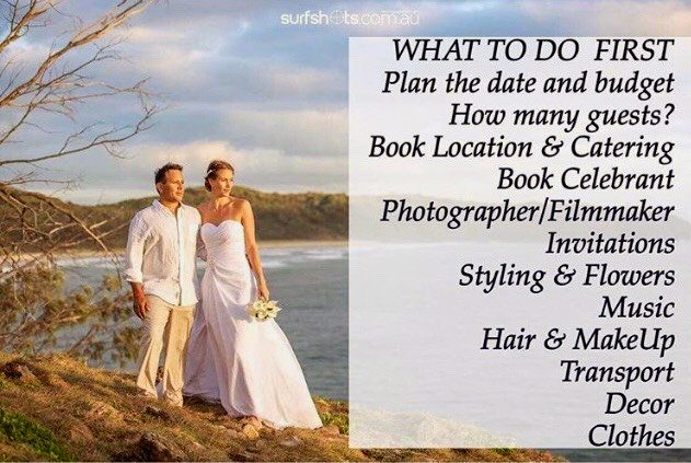 smiling couple at sunrise on a grassy mountain after their Noosa elopement